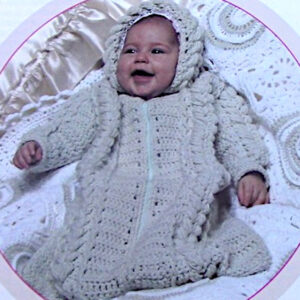 A Off-White Bunting in Leaf Puff Stitch in Worsted Yarn - Shown on a Newborn - from a Vintage Crochet Pattern for Sizes 0 to 3 Months.