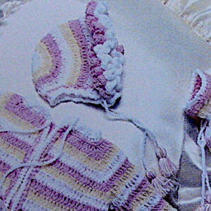 Striped baby set: jacket, hat, and booties in baby yarn - 1970s free vintage crochet pattern.